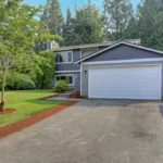 Why Kirkland’s Waterfront Homes Need Specialized Garage Door Installations: A Coastal Durability Guide
